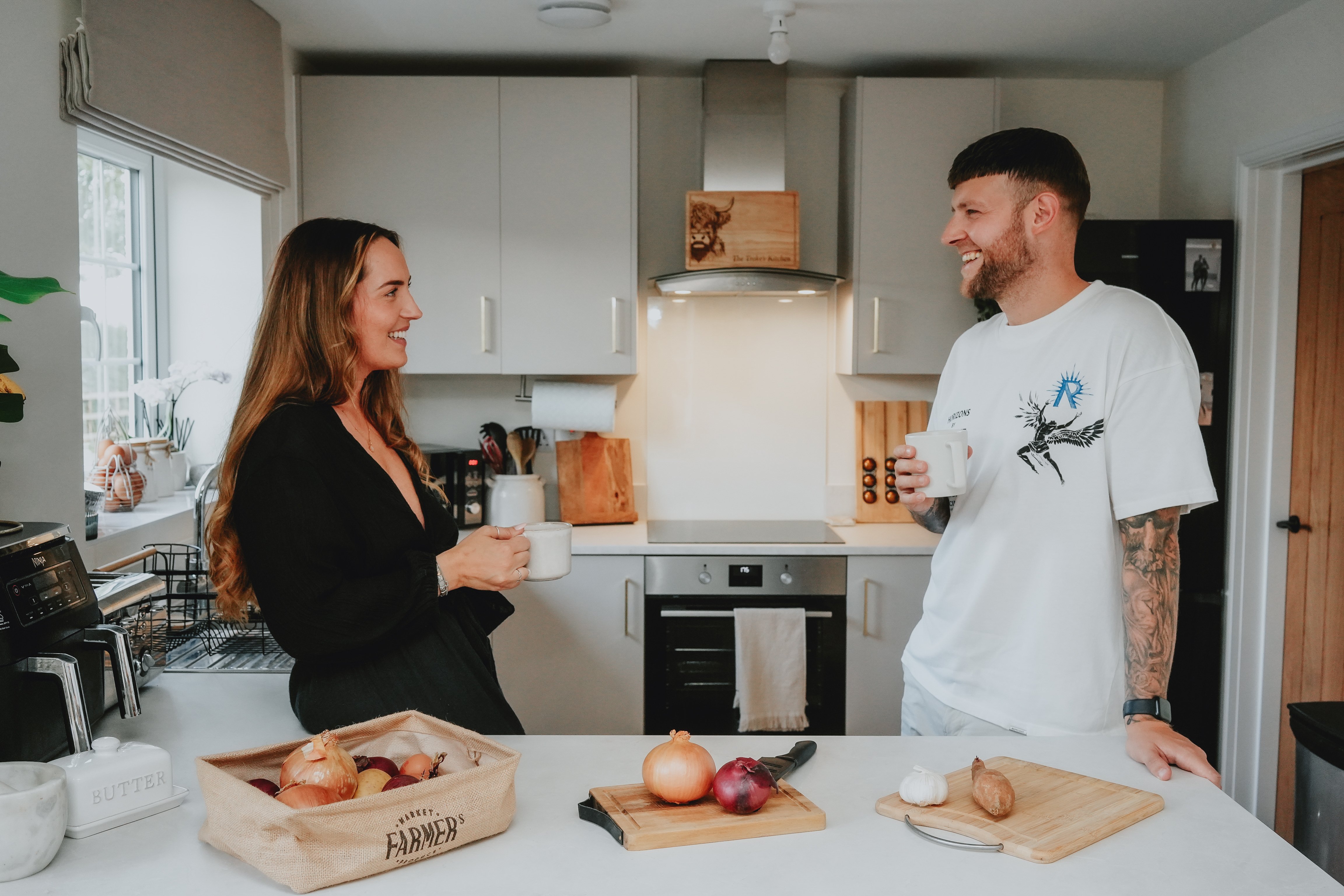 Hayley and her fiancé Alex enjoying their new kitchen