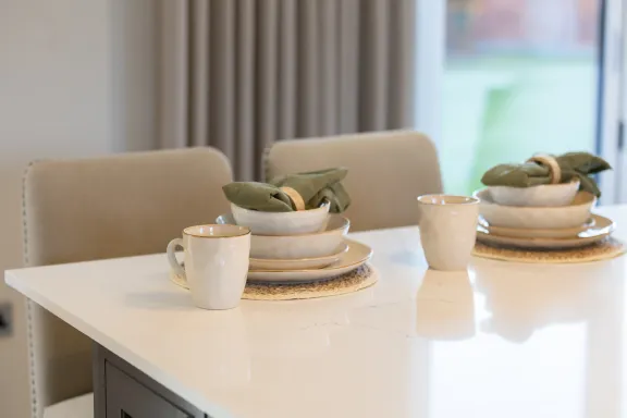 Close up of tableware on marble worktop